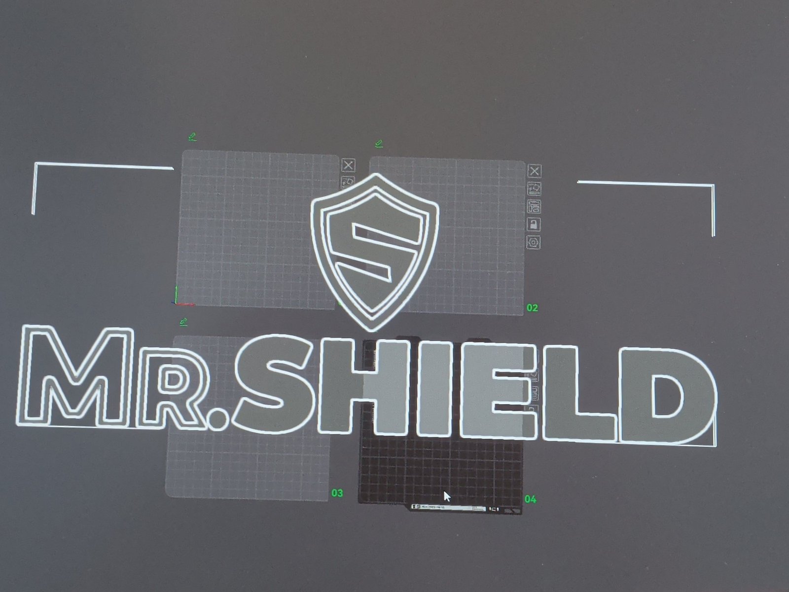 Il logo Mr Shield nel programma di stampa, diviso in pezzi distribuiti su più piatti della stampante 3D