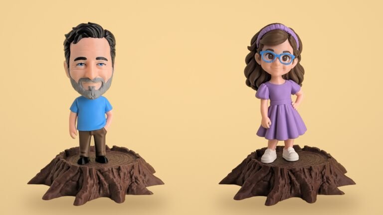 Statuine stampate in 3D di un papà e una bambina su ceppi di legno